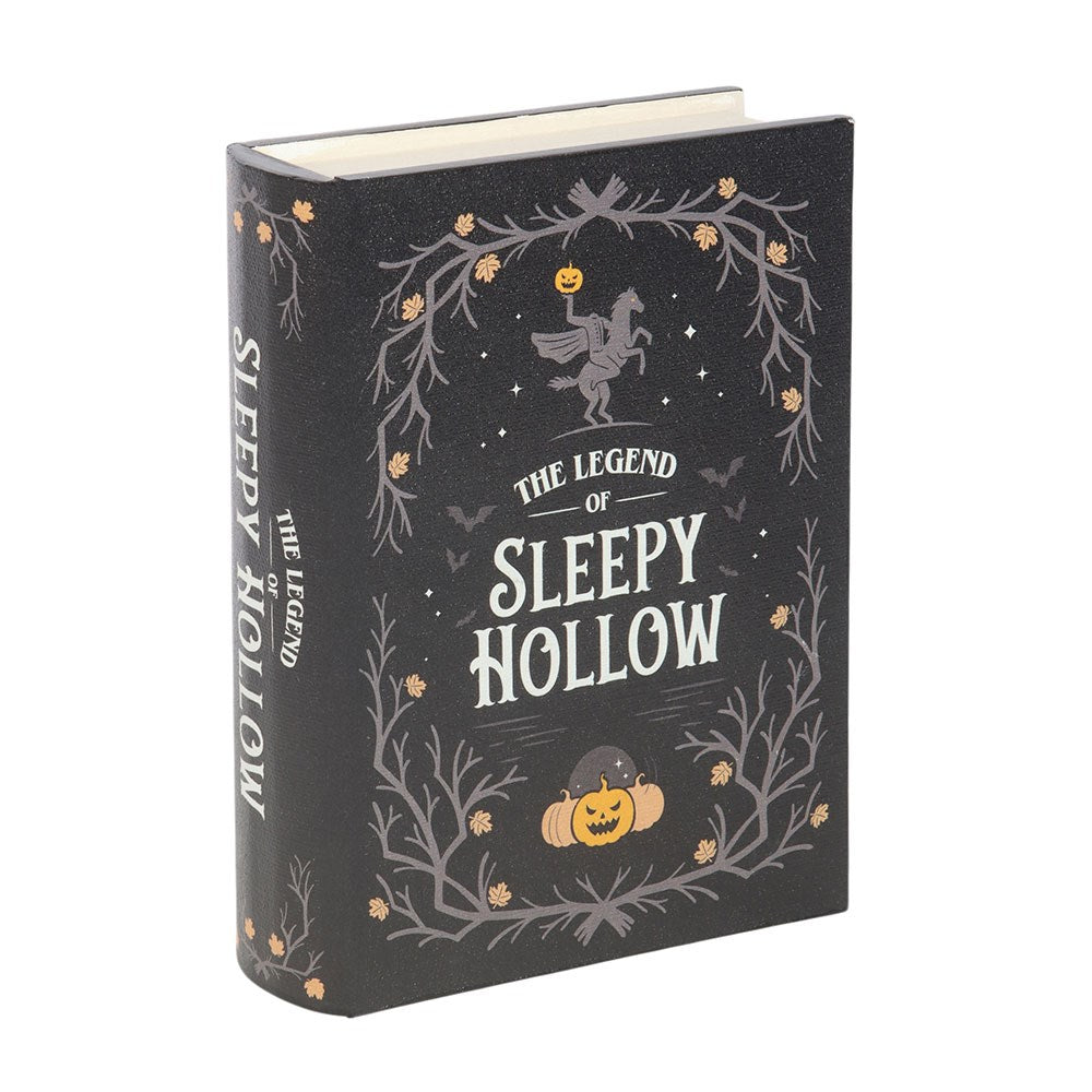 Book Box titled 'The Legend of Sleepy Hollow' with decorative cover featuring pumpkins and a horse, candle in the background.