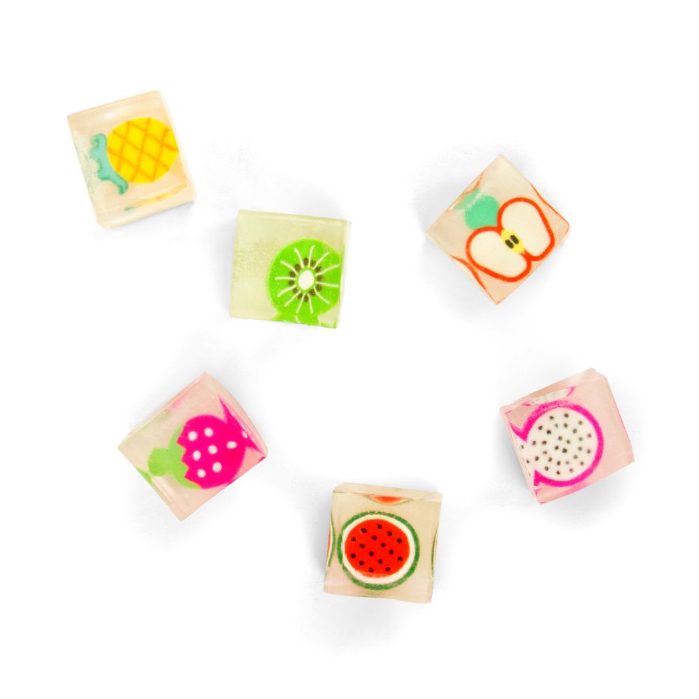Set of colourful fruit-themed Squishy Ice Cubes on a white background