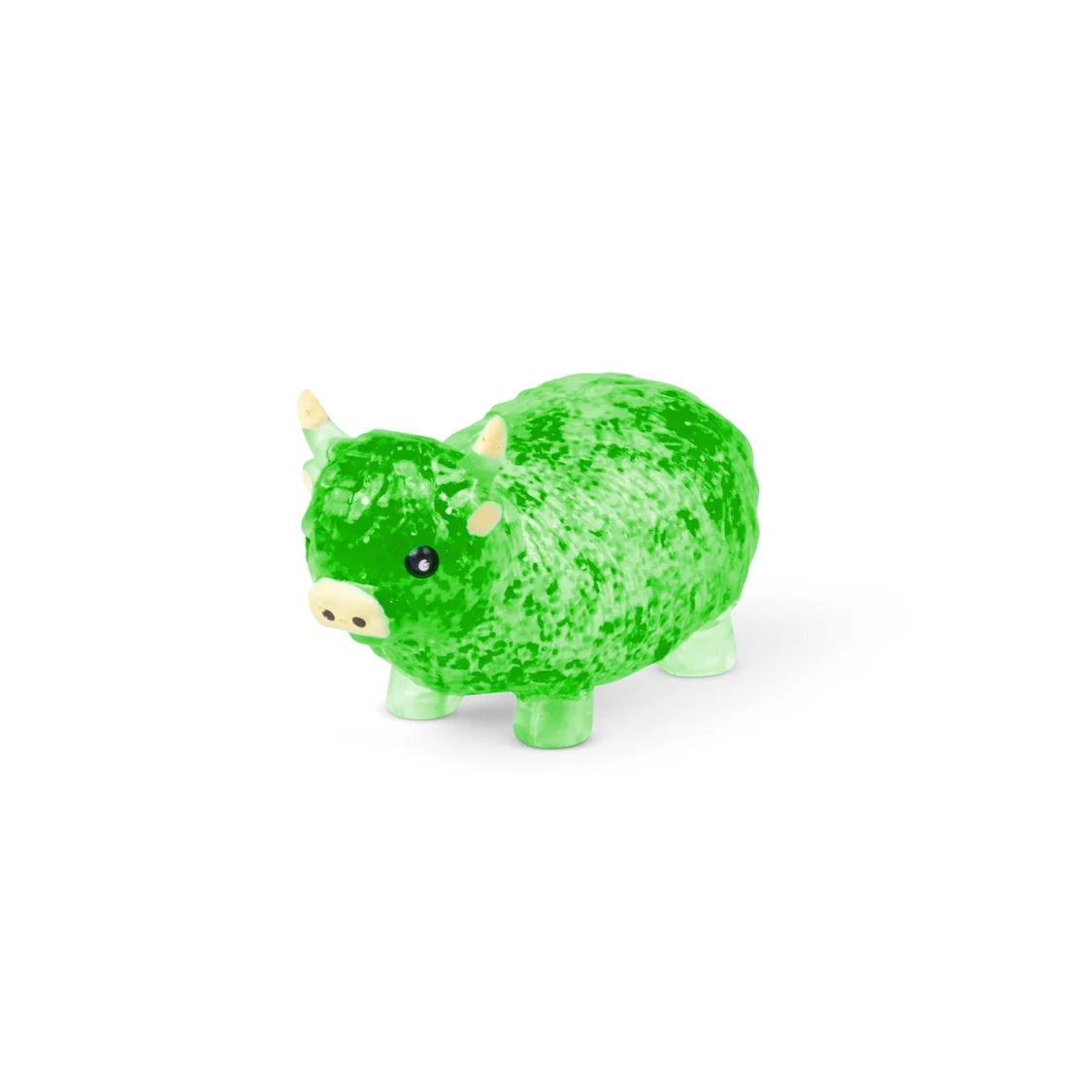 Green toy sugar highland cow on a white background