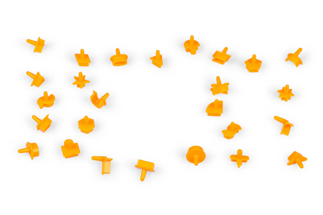 Orange puzzle pieces scattered on a white background