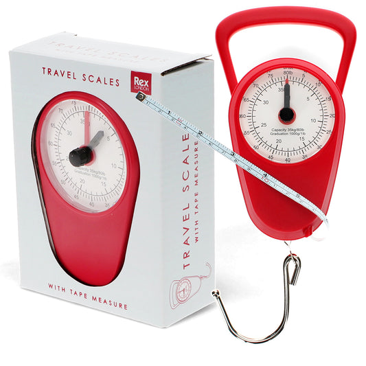 Mechanical travel scales in red, with built-in tape measure. outside with box