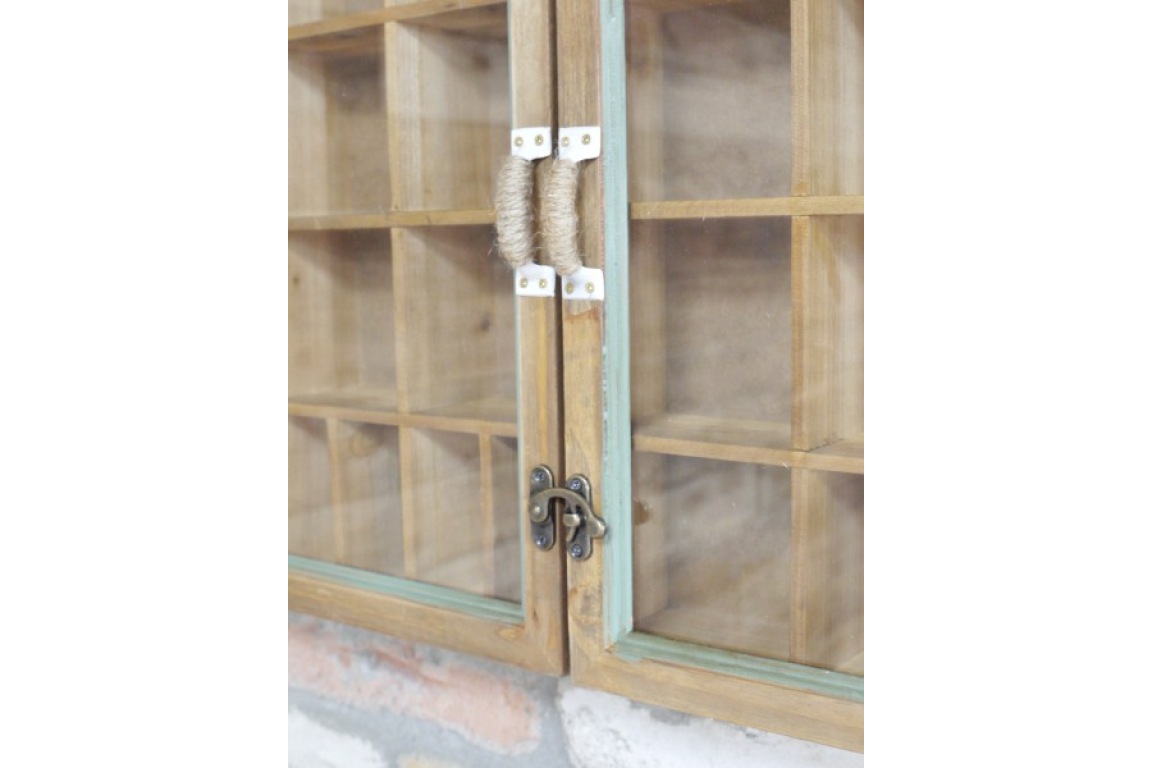 Wooden cabinet with glass doors and metal handles on a white background