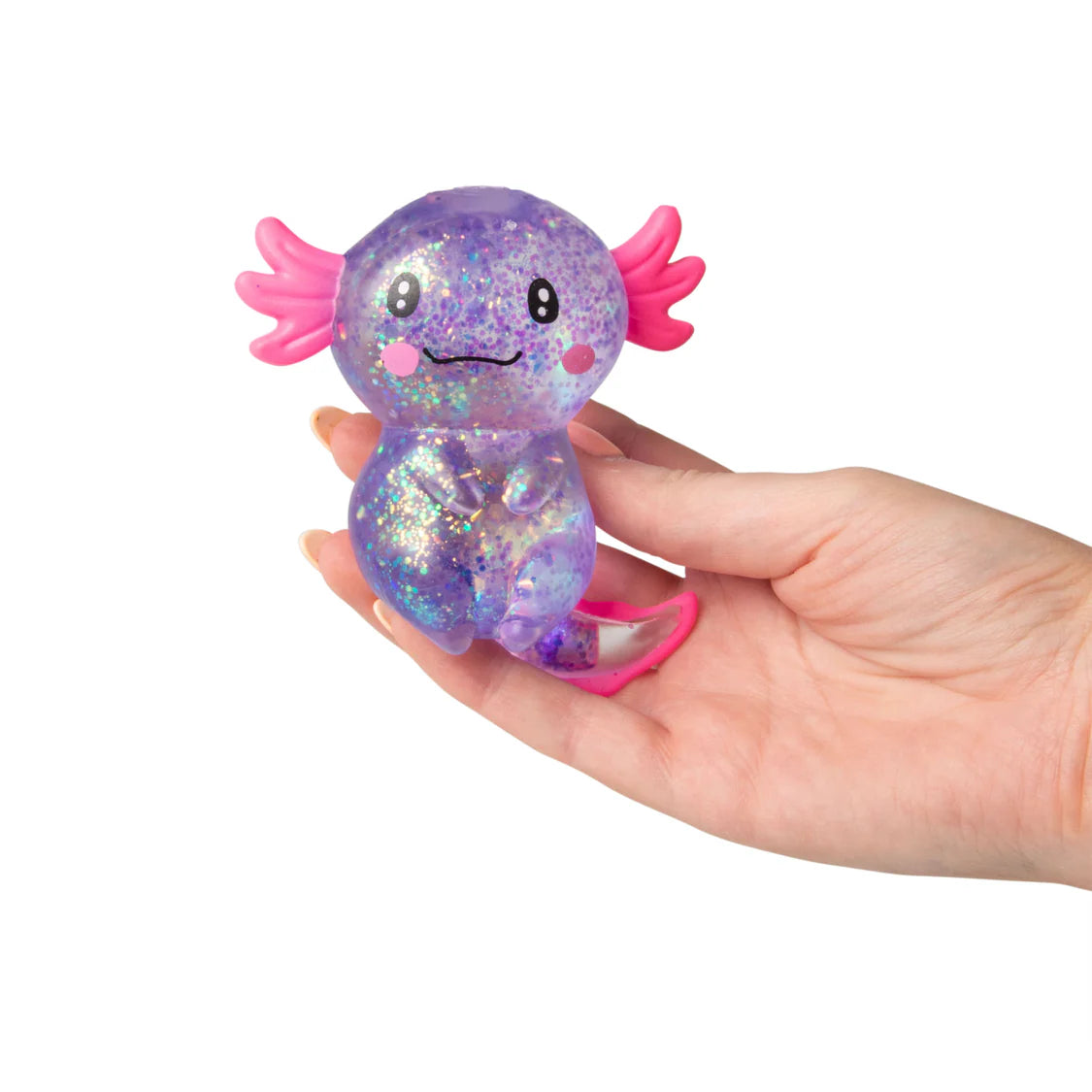 Hand holding a glittery purple axolotl toy with pink accents on a white background