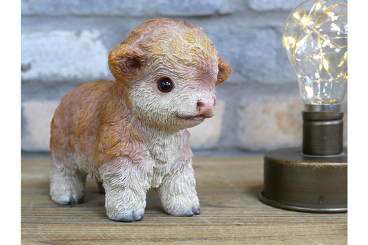 Little Baby Cow ornament brown and white with a very sweet face