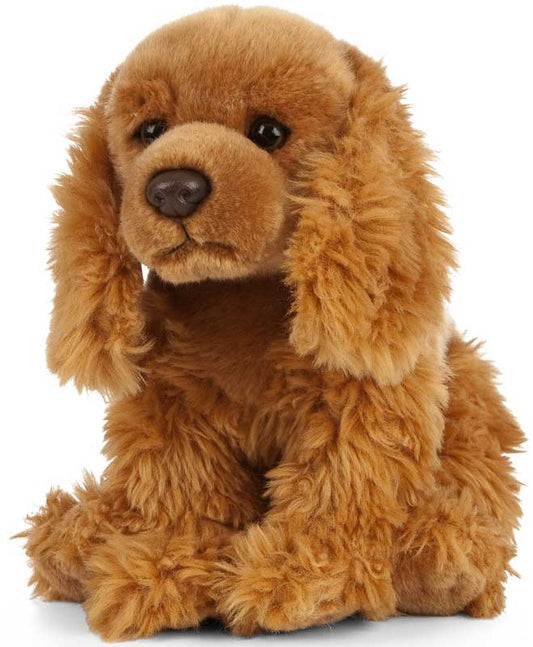 Plush brown dog toy on a white background