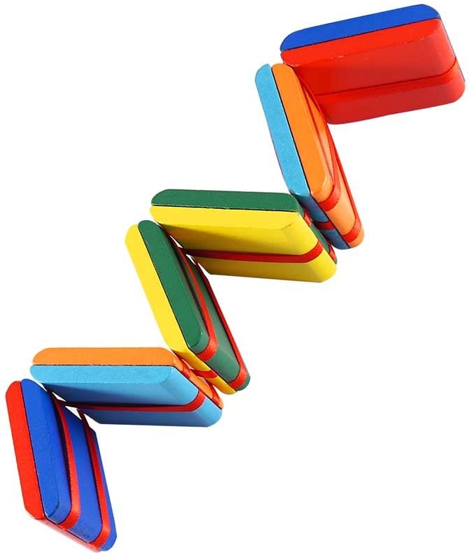 Colourful wooden tiles stacked in a zigzag pattern on a white background