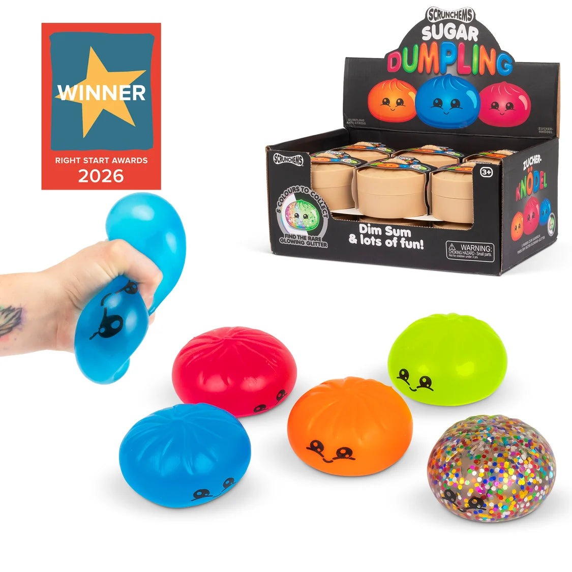 A set of colorful dim sum-themed squishy stress balls with cartoon faces, shown alongside a black display box and a hand squeezing a blue one. A red, yellow, and blue 'Winner Right Start Awards 2026' badge is displayed in the top left corner.