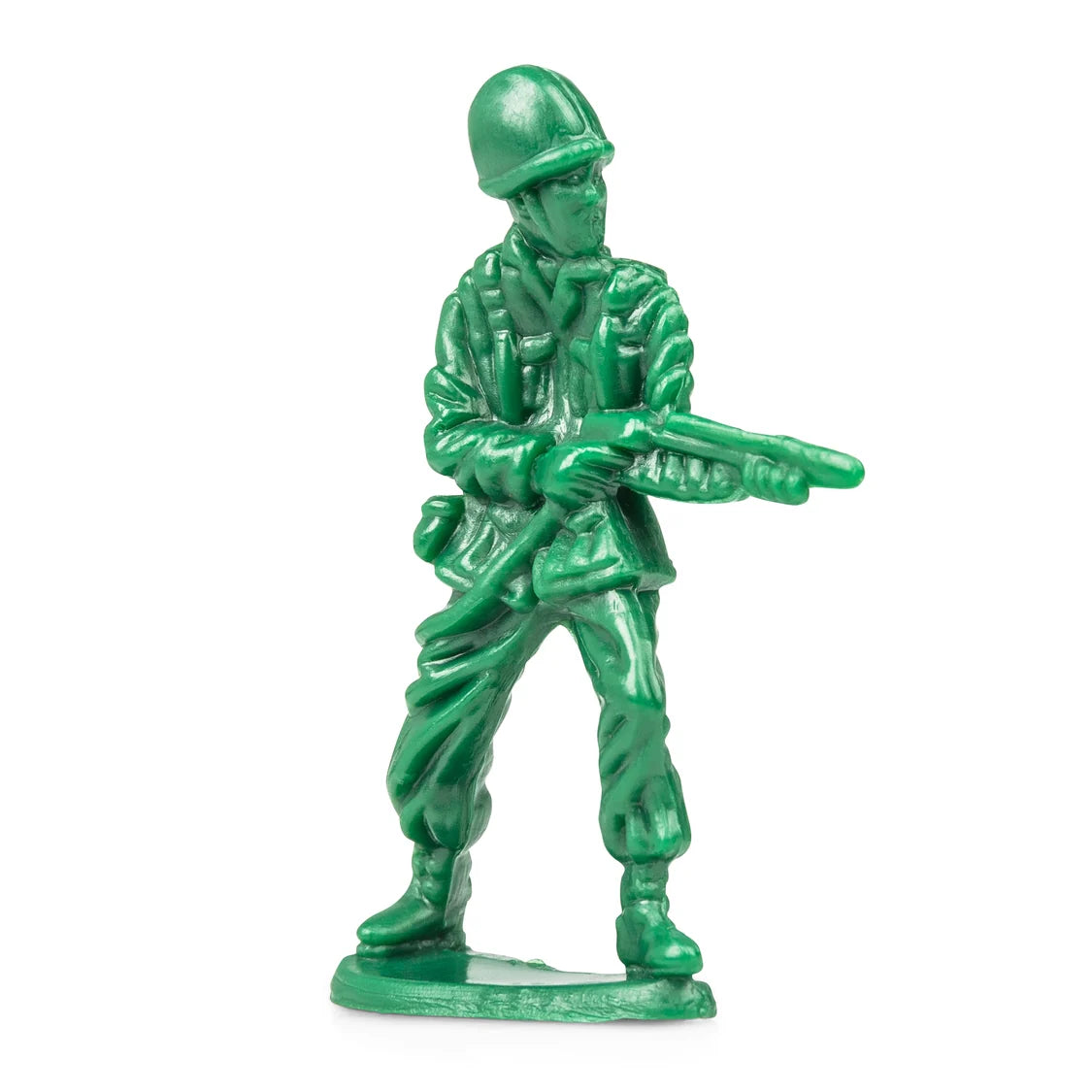 Green toy soldier figure holding a rifle on a white background